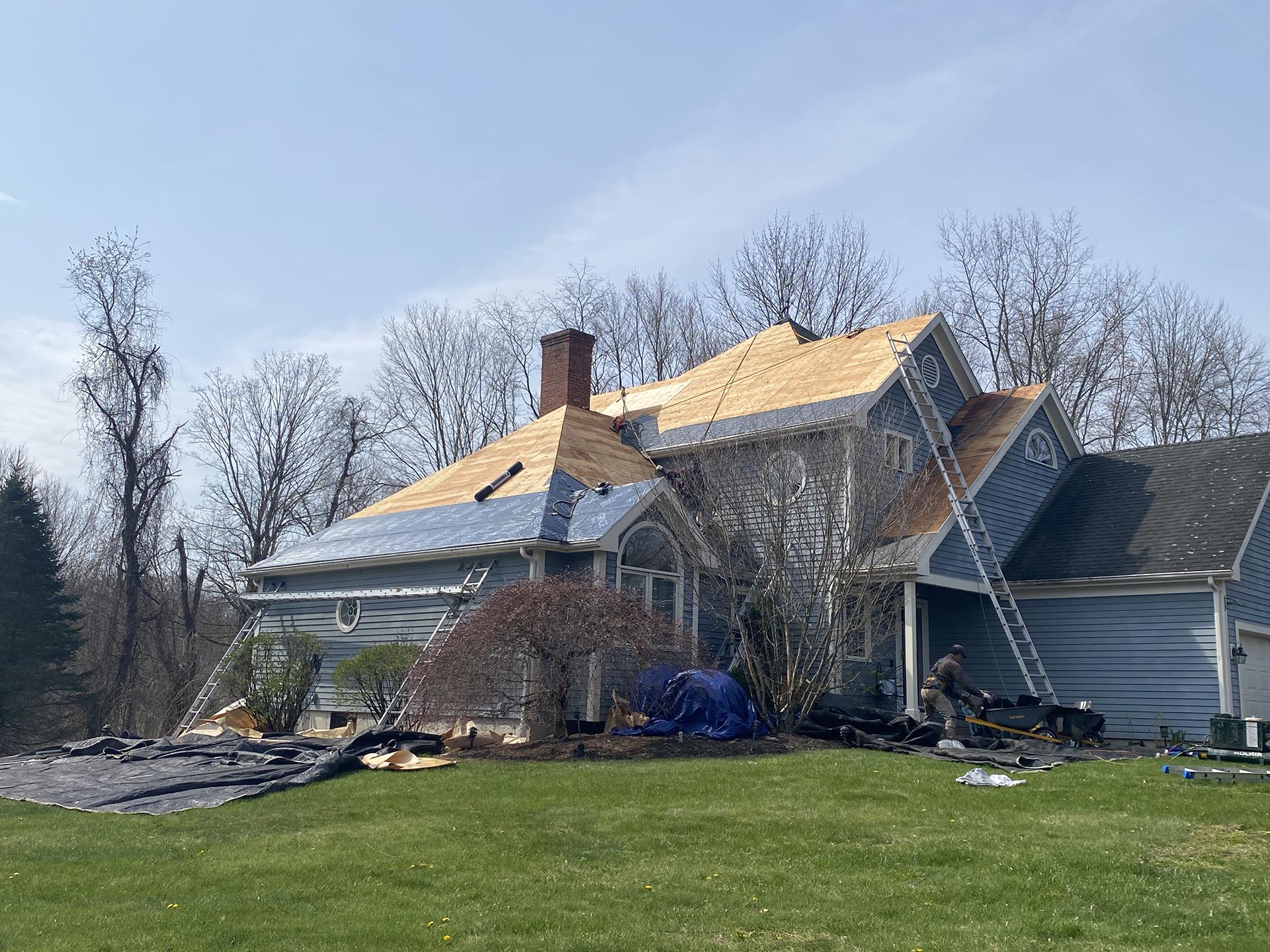 Able Roofing crew completing a residential roof replacement in Connecticut