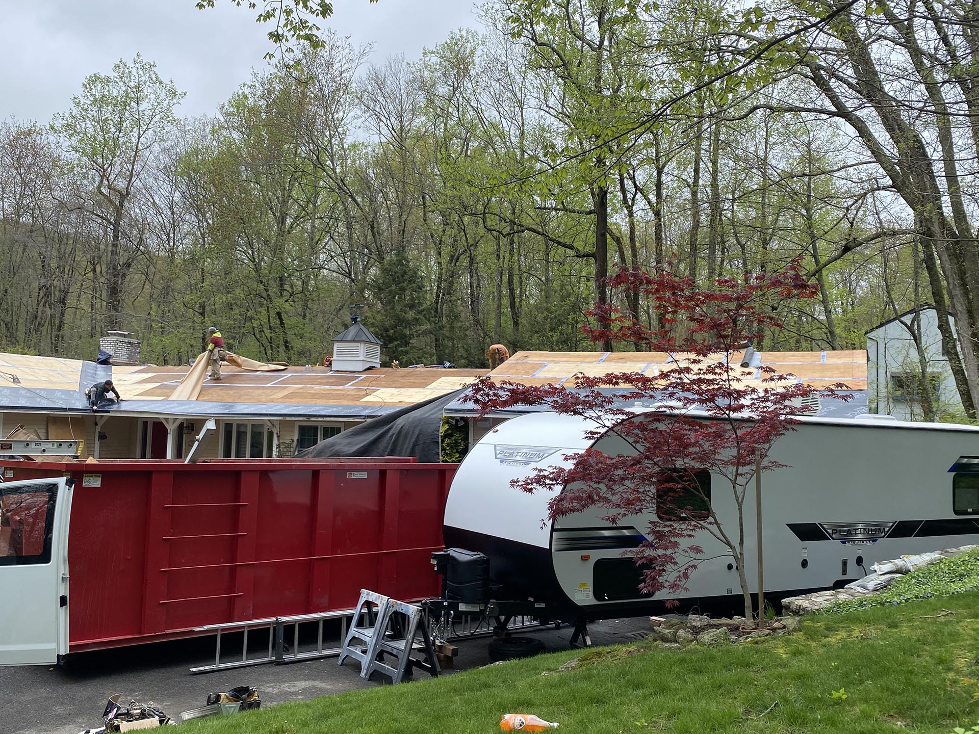 Able Roofing crew protecting a Connecticut property during replacement
